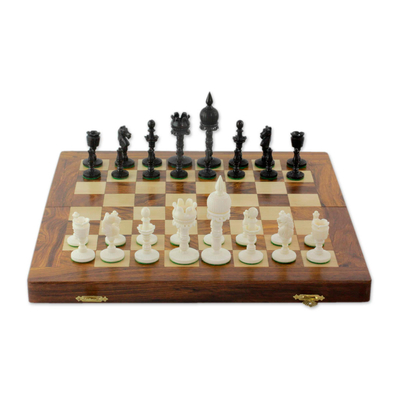 Bone and wood travel chess set, 'Castles Clash' - Hand-Carved Bone and Wood Travel Chess Set from India