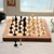 Bone and wood travel chess set, 'Castles Clash' - Hand-Carved Bone and Wood Travel Chess Set from India (image 2b) thumbail