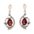 Rhodium plated garnet dangle earrings, 'Fascinating Swoop' - Curve Pattern Rhodium Plated Garnet Dangle Earrings thumbail