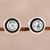 Blue topaz stud earrings, 'Graceful Frames' - Circular Blue Topaz Stud Earrings from India