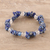 Lapis lazuli and quartz beaded stretch bracelet, 'Lake Charm' - Lapis Lazuli and Clear Quartz Beaded Stretch Bracelet