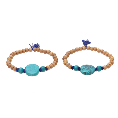 Wood and resin beaded stretch bracelets, 'Royal Friends' (pair) - Blue Tassel Wood and Resin Beaded Stretch Bracelets (Pair)