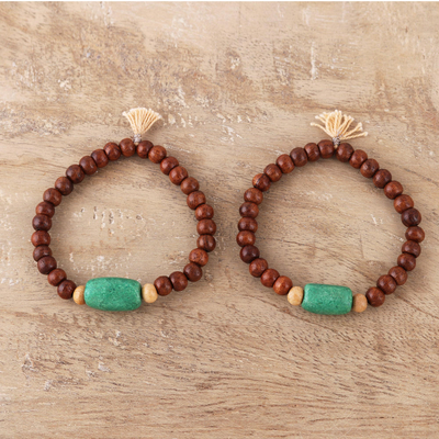Wood and resin beaded stretch bracelets, 'Friendship Harmony' (pair) - Wood and Green Resin Beaded Stretch Bracelets (Pair)