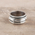 Sterling silver spinner ring, 'Rotating Pattern' - Artisan Crafted Sterling Silver Spinner Ring from India