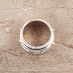 Sterling silver spinner ring, 'Rotating Pattern' - Artisan Crafted Sterling Silver Spinner Ring from India