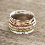 Sterling silver spinner ring, 'Mesmerizing Triple' - Textured Sterling Silver Spinner Ring from India