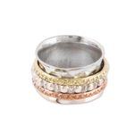 Sterling silver spinner ring, 'Mesmerizing Triple' - Textured Sterling Silver Spinner Ring from India