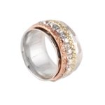 Sterling silver spinner ring, 'Mesmerizing Triple' - Textured Sterling Silver Spinner Ring from India