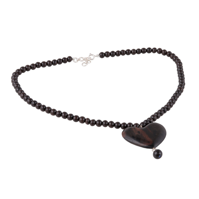 Ebony wood beaded pendant necklace, 'Love in the Heart' - Heart-Shaped Ebony Wood Beaded Pendant Necklace from India