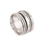 Sterling silver spinner ring, 'Rotating Style' - Patterned Sterling Silver Spinner Ring from India