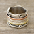 Sterling silver spinner ring, 'Creative Flair' - Sterling Silver Spinner Ring with Brass and Copper