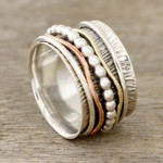 Sterling silver spinner ring, 'Dotted Flair' - Patterned Sterling Silver Spinner Rig with Brass and Copper