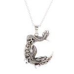 Sterling silver pendant necklace, 'Dragon Crescent' - Dragon Crescent Sterling Silver Pendant Necklace from India