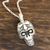 Sterling silver pendant necklace, 'Grinning Cross' - Sterling Silver Skull Cross Pendant Necklace from India