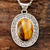 Tiger's eye pendant necklace, 'Dancing Earth' - Oval Tiger's Eye Pendant Necklace from India (image 2) thumbail