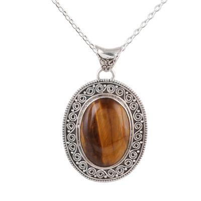 Tiger's eye pendant necklace, 'Dancing Earth' - Oval Tiger's Eye Pendant Necklace from India