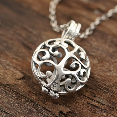 Sterling silver locket necklace, 'Happy Curl' - Curl Pattern Sterling Silver Locket Necklace from India