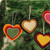 Wool felt ornaments, 'Entrancing Hearts' (set of 4) - Colorful Wool Felt Heart Ornaments from India (Set of 4) (image 2b) thumbail