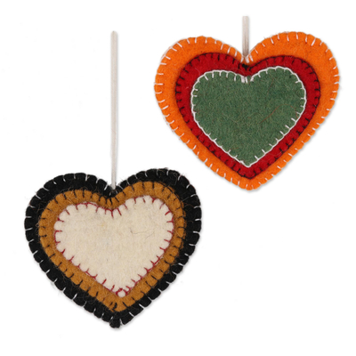 Wool felt ornaments, 'Entrancing Hearts' (set of 4) - Colorful Wool Felt Heart Ornaments from India (Set of 4)