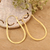 Gold plated sterling silver hoop earrings, 'Mystic Loops' - 22k Gold Plated Sterling Silver Hoop Earrings from India thumbail
