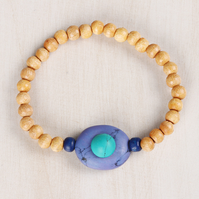 Wood and resin beaded stretch bracelets, 'Watery Planets' (pair) - Wood and Resin Beaded Stretch Bracelets from India (Pair)
