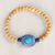 Wood beaded stretch bracelets, 'Watery Planets' (pair) - Wood Beaded Stretch Bracelets from India (Pair)
