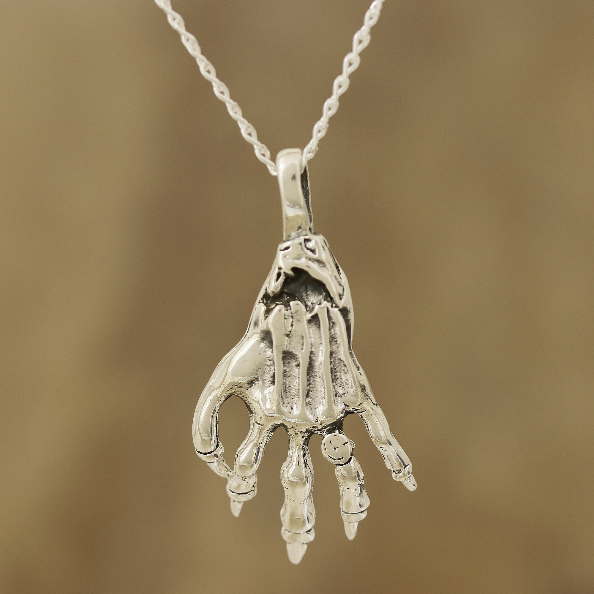 Sterling silver store skeleton pendant