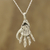 Sterling silver pendant necklace, 'Mighty Hand' - Skeleton Hand Sterling Silver Pendant Necklace from India