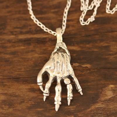 Sterling silver pendant necklace, 'Mighty Hand' - Skeleton Hand Sterling Silver Pendant Necklace from India