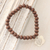 Wood beaded stretch bracelet, 'Boho Leaf' - Wood Beaded Stretch Bracelet from India