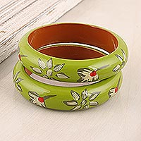 Wood bangle bracelets, 'Lime Bloom' (pair) - Floral Haldu Wood Bangle Bracelets in Lime from India (Pair)
