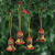Holzornamente, (2 Zoll, 4er-Set) - Holzglocken-Ornamente mit Hirschmotiv aus Indien (2 Zoll, 4er-Set)