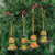 Wood ornaments, 'Floral Paradise' (set of 4) - Floral Motif Wood Bell Ornaments from India (Set of 4)