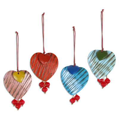 Wood ornaments, 'Zigzag Hearts' (set of 4) - Mango Wood Heart Ornaments from India (Set of 4)