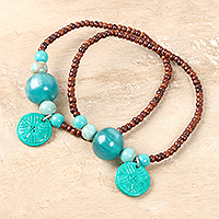 Wood beaded stretch bracelets, 'Oceanic Harmony' (pair) - Wood Beaded Stretch Bracelets (Pair)