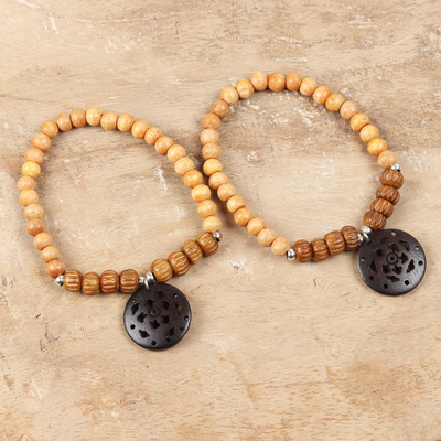 Bone and wood beaded stretch bracelets, 'Fascinating Delight in Brown' (pair) - Brown Bone and Wood Beaded Stretch Bracelets (Pair)