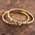 Brass bangle bracelets, 'Delightful Procession' (pair) - Patterned Brass Bangle Bracelets from India (Pair) thumbail
