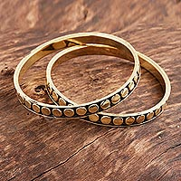 Brass bangle bracelets, 'Delightful Dots' (pair) - Dot Pattern Brass Bangle Bracelets from India (Pair)