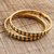 Brass bangle bracelets, 'Delightful Dots' (pair) - Dot Pattern Brass Bangle Bracelets from India (Pair) (image 2b) thumbail