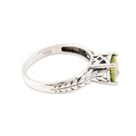 Peridot solitaire ring, 'Sparkling Crown' - Faceted Peridot Solitaire Ring from India