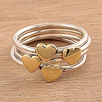 Sterling silver band rings, 'Heart Royalty' (set of 4) - Sterling Silver and Brass Heart Band Rings from India