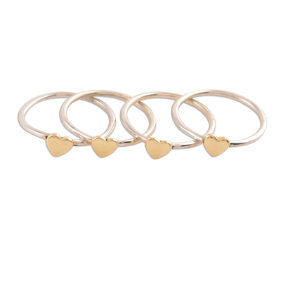 Sterling silver stacking rings, 'Heart Royalty' (set of 4) - Sterling Silver and Brass Heart Stacking Rings (Set of 4)