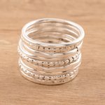 Sterling silver band rings, 'Friendship Patterns' (set of 9) - Sterling Silver Band Rings Crafted in India (Set of 9)