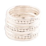 Sterling silver band rings, 'Friendship Patterns' (set of 9) - Sterling Silver Band Rings Crafted in India (Set of 9)
