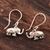 Sterling silver dangle earrings, 'Excited Elephants' - Sterling Silver Elephant Dangle Earrings Crafted in India