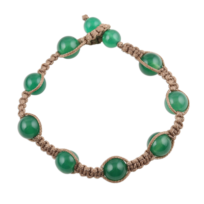 Onyx beaded bracelet, 'Green Planets' - Hand-Knotted Green Onyx Macrame Bracelet from India