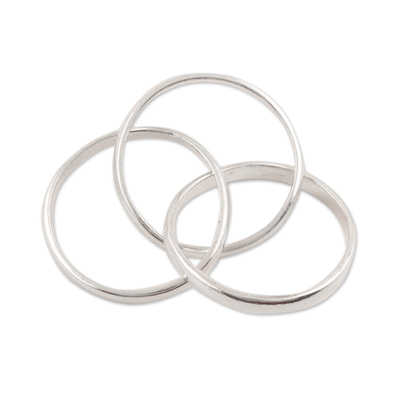 Sterling silver band ring, 'Shiny Trio' - Sterling Silver Interlocked Band Ring Crafted in India