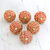 Knöpfe aus Mangoholz, (6er-Set) - Set aus 6 roten Perlen und vergoldeten Mangoholzknöpfen