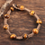 Tiger's eye beaded bracelet, 'Warm Planets' - Hand-Knotted Tiger's Eye Macrame Bracelet from India