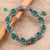 Onyx beaded bracelet, 'Green Macrame Halo' - Green Onyx Macrame Hand-Knotted Bracelet from India